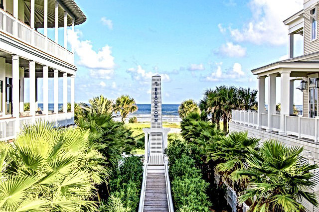 The Beachtown complex’s landmark, a marker with the town’s name surrounded by small palm trees.