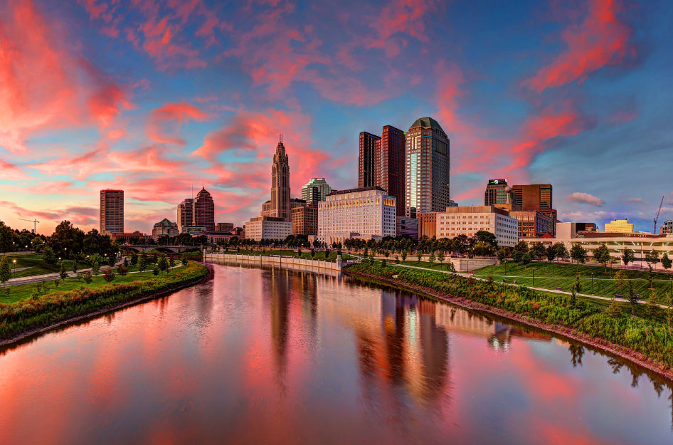 Sunset view of the Columbus, Ohio, skyline seen from the river