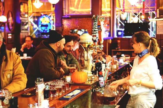 Locals enjoy a pint at Der Braumeister, a favorite bar and restaurant in the Jefferson neighborhood of Cleveland, Ohio.