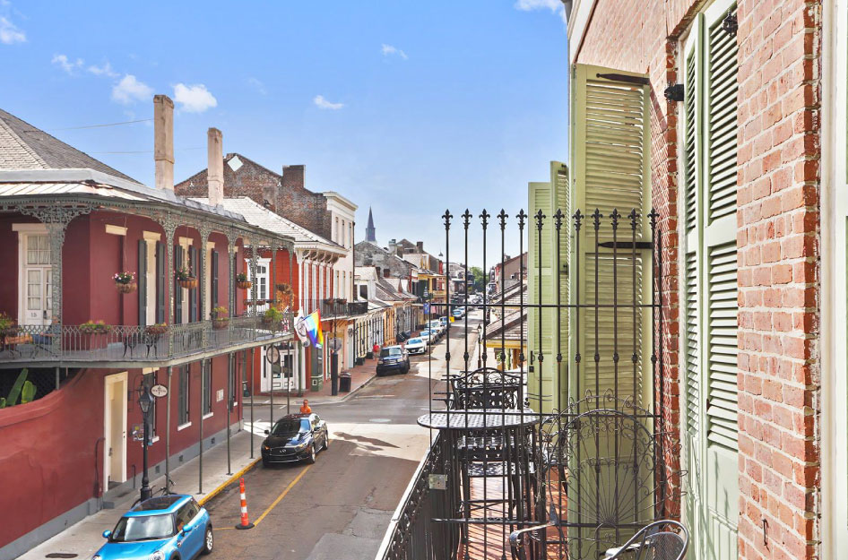 View of New Orleans’ French Quarter neighborhood from a residential balcony.