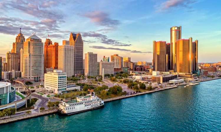 Aerial view of Detroit, Michigan, just before sunset with the light reflecting off the tall downtown buildings.