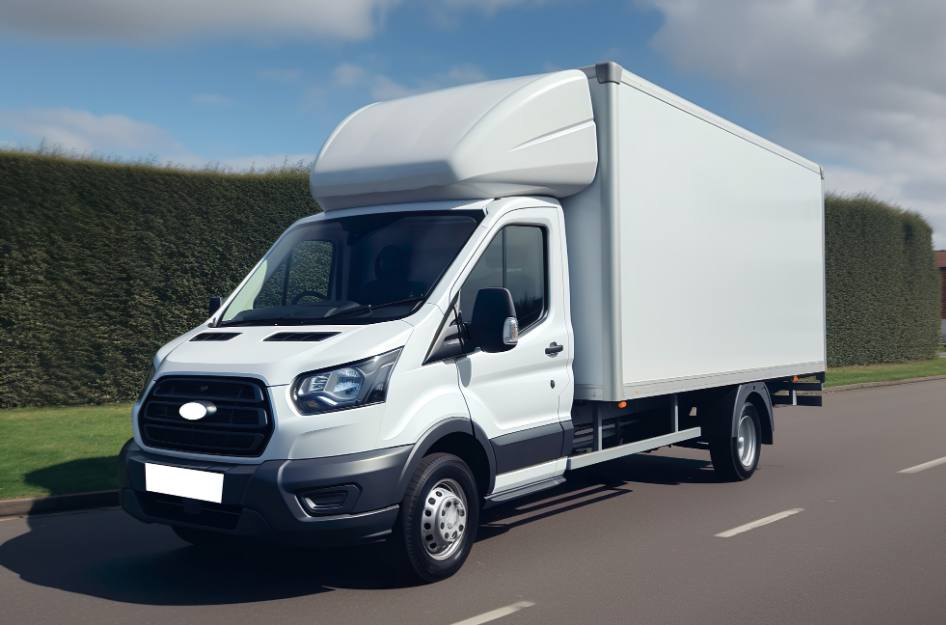 A rental moving truck sits in the road, it's the perfect size for a local move.