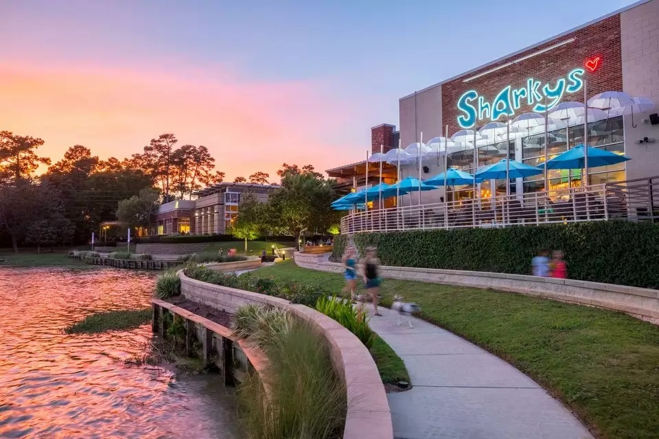 View of waterfront restaurants in Kingwood — one of the best neighborhoods in Houston.