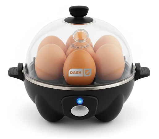 A compact DASH Electric Rapid Egg Cooker kitchen appliance in black with a clear lid, cooking seven eggs at once.