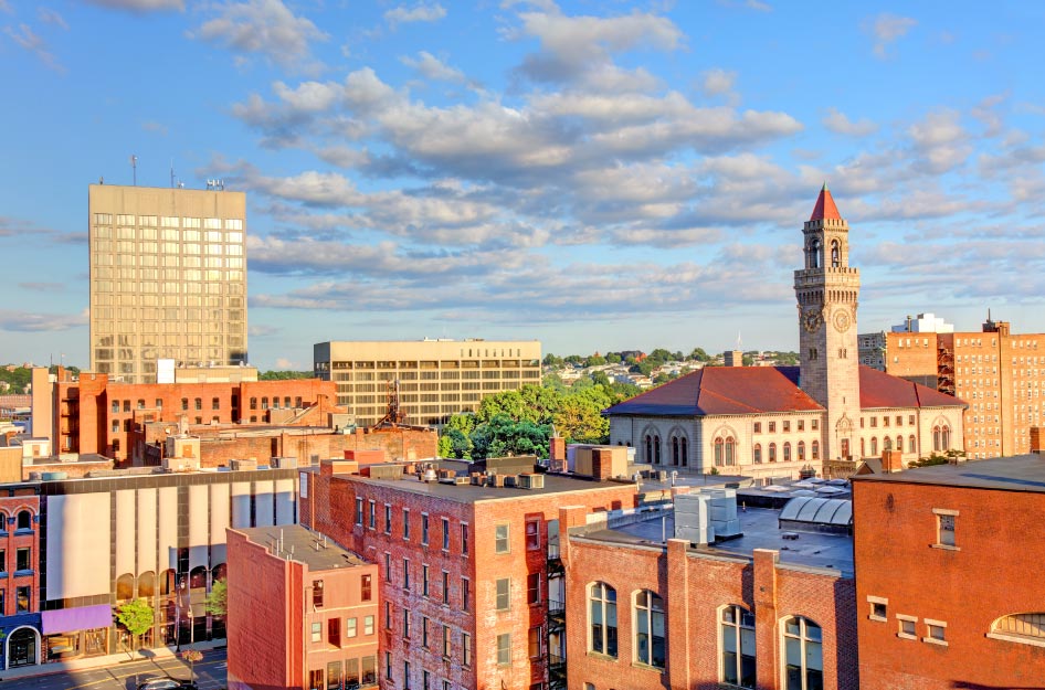 Rooftop view of red brick buildings in Downtown Worcester— one of the best Worcester neighborhoods.