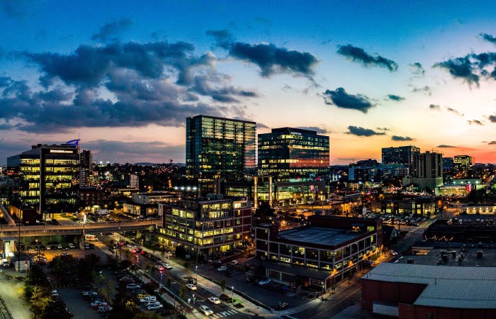 Twilight, aerial view of The Gulch, an urban retail district and one of the best areas to live in Nashville, Tennessee.