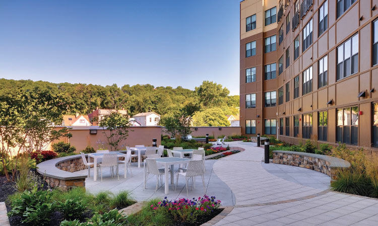 An outdoor seating area at the Valley & Bloom apartment community in Montclair, New Jersey. 