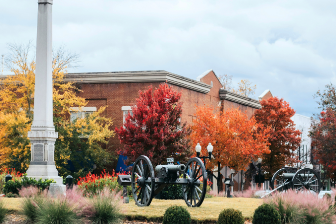 A Civil War monument surrounded by fall leaves in Franklin, TN.
