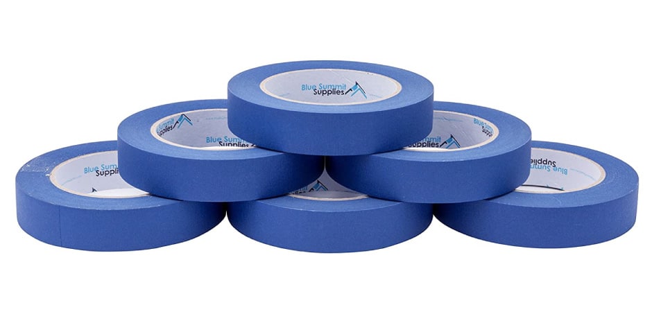 Blue painter’s tape, like the six rolls pictured here, is extremely handy during a move.