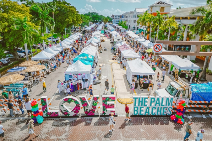 Aerial view of The Delray Affair arts festival — one of the many things to do in Delray Beach — featuring vendors, tents, arts and crafts, and over 400 artists.