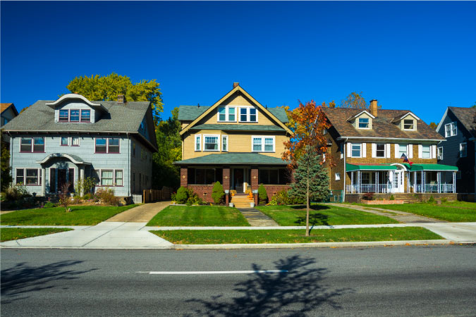 A row of single-family homes in Cleveland, Ohio, each with its own distinct character