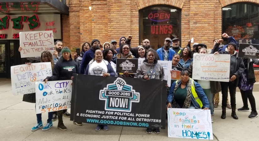 Two dozen locals from a Detroit community action group are gathered for a peaceful protest in the city.