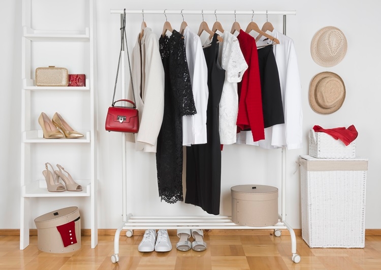 closet organizer ideas include getting an extra clothes rack when you simple don't have enough space in your closet