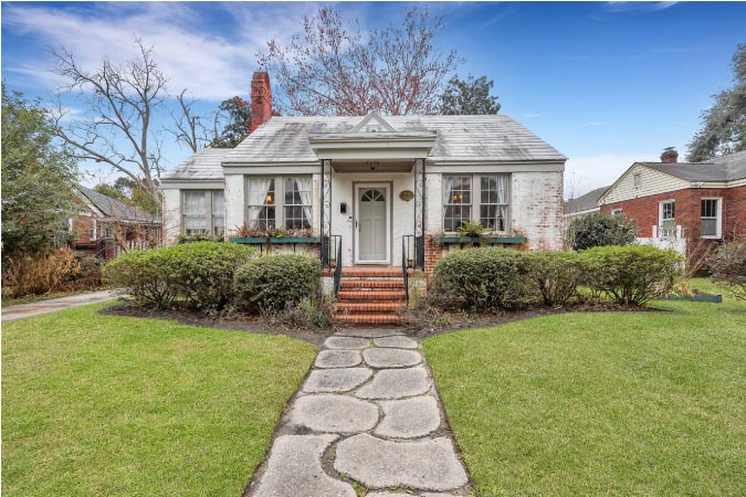 Exterior view of a 1940s bungalow in Ardsley Park — one of the best neighborhoods in Savannah.
