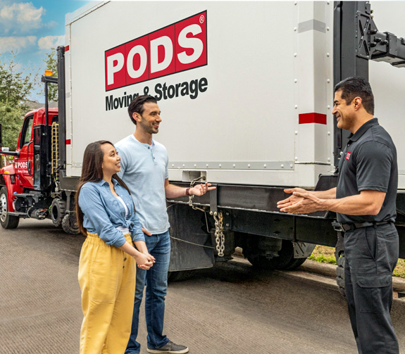 PODS driver assisting customers