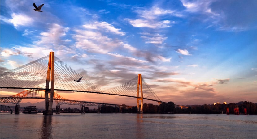 Fraser river, skytrain bridge and Pattullo bridge, which expanded Surrey when it was built in 1936.