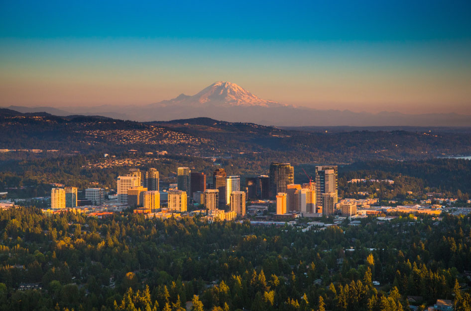 Sunset aerial view of Bellevue, Washington (a Seattle suburb) with Mt. Rainier in the background.