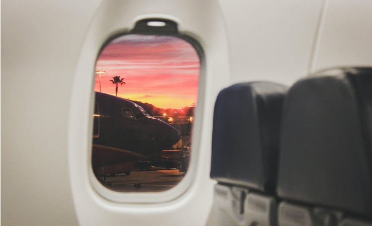 View from an airplane window in a California airport while waiting to depart