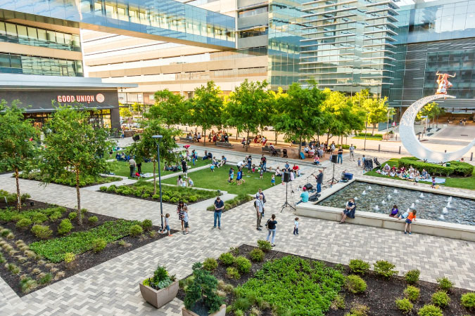 A daytime aerial view of the plaza at CityLine DFW in Richardson, Texas — one of the most popular cities near Dallas for tech professionals.
