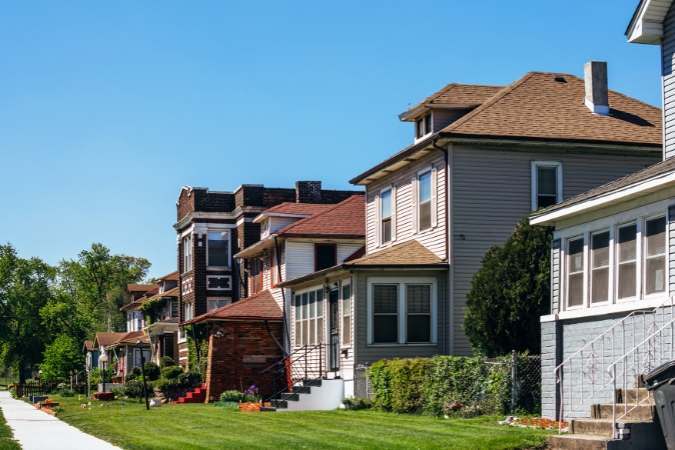 A row of residential homes in the city of Gary, highlighting the variety of housing options available to those living in Indiana.
