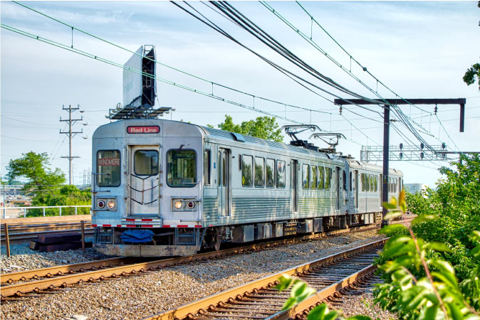 A train traveling on the Cleveland Rapid Transit Red Line approaches Windermere Station in Cleveland, Ohio.