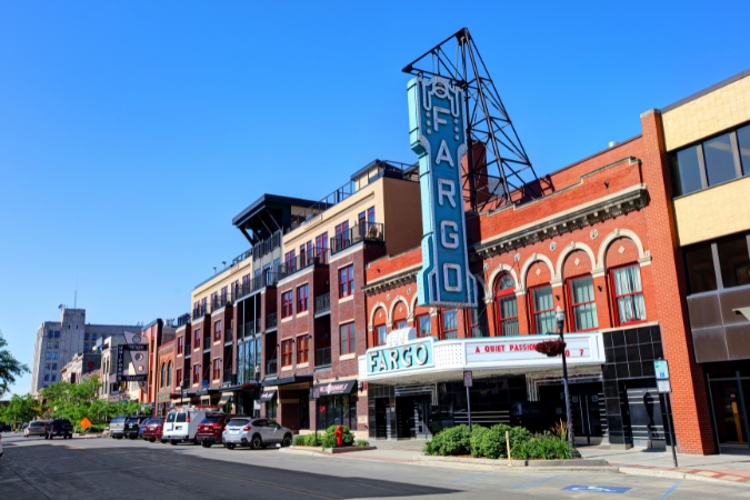 Antique storefronts line a street in the Downtown Historic District of Fargo in North Dakota — one of the best states to live in for young adults.