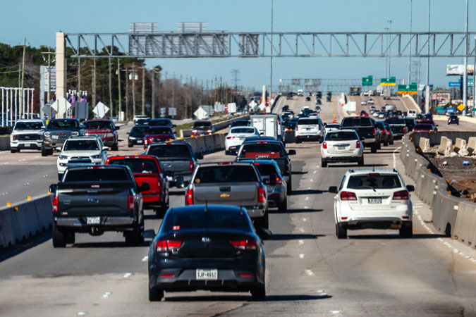 Six lanes of divided traffic moving in and out of the city — an everyday sight for those living in Houston, Texas.