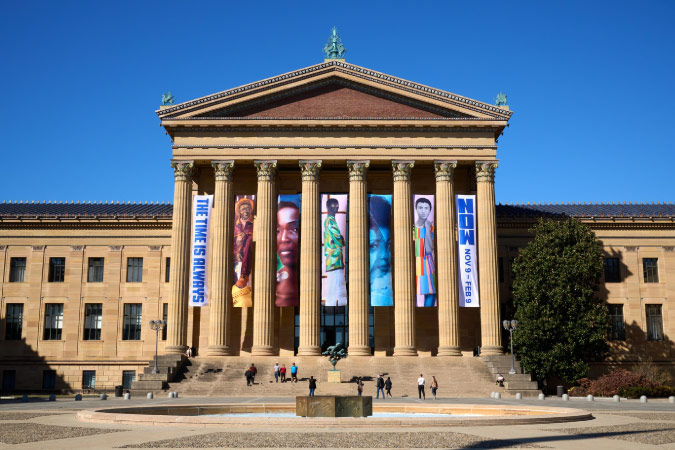The entrance to the Philadelphia Museum of Art, featuring 8 majestic columns in the corinthian style beneath an impressive pediment.