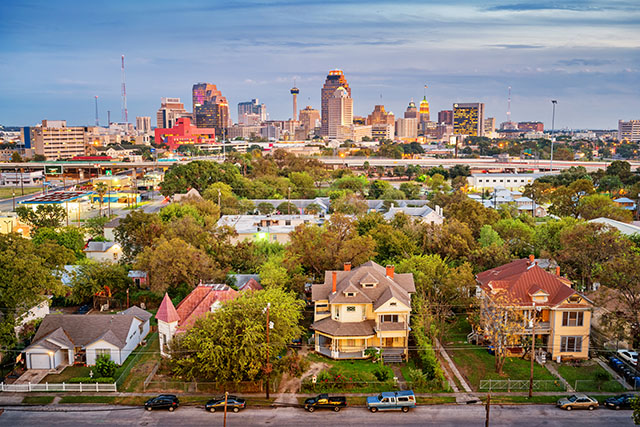 A San Antonio residential district with the downtown skyline in the background