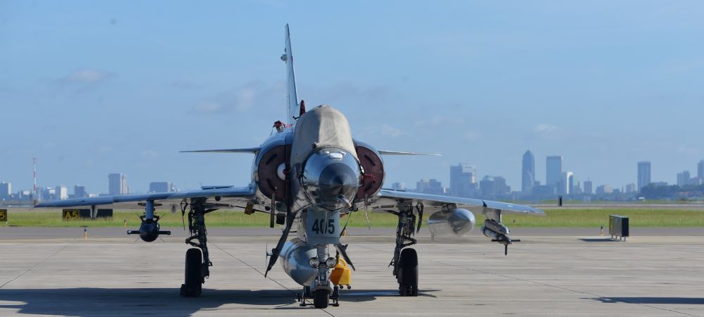 A military jet is parked at the third-largest Navy base in the U.S., Jacksonville Naval Air Station — a major military and civilian employer in the area.