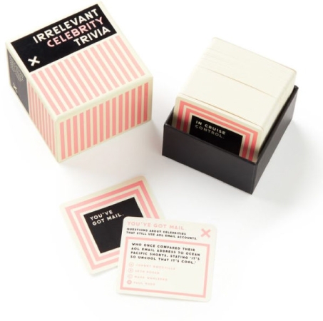 The “Irrelevant Celebrity Trivia” card game with trendy pink and black box and matching cards.