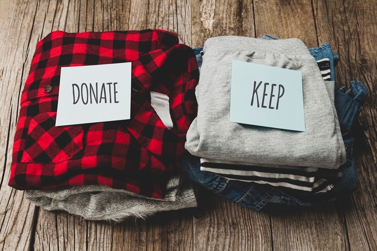 Decluttering your clothes is one of many quick and easy ways to organize a cluttered closet