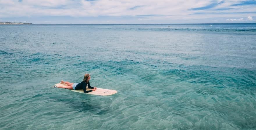 woman on surfboard