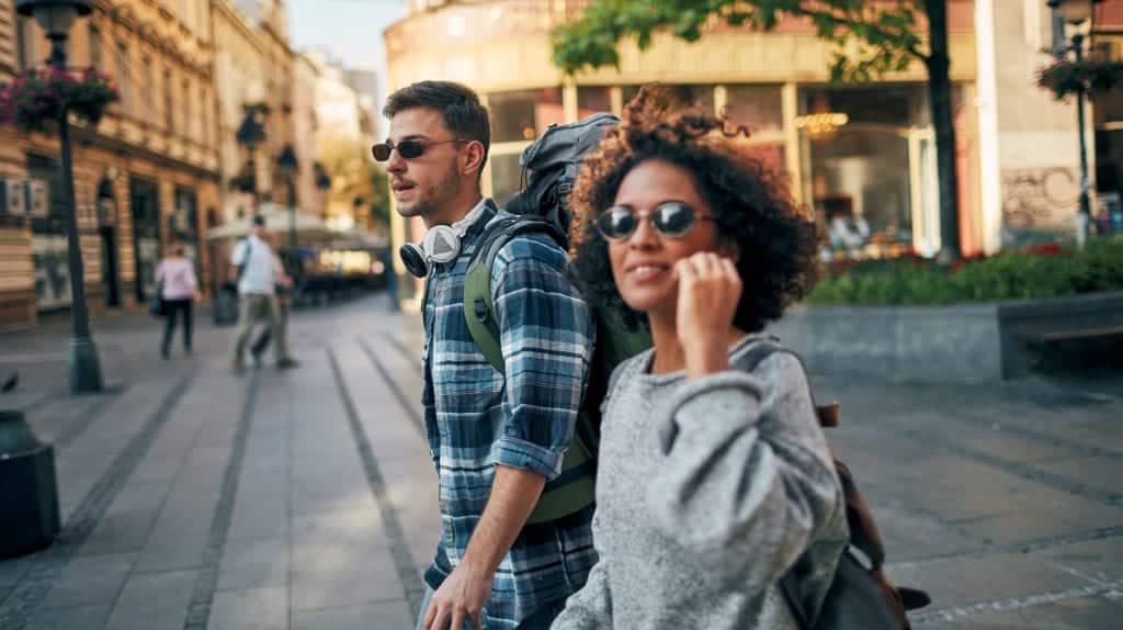 A couple is exploring a city that they're planning to move to.