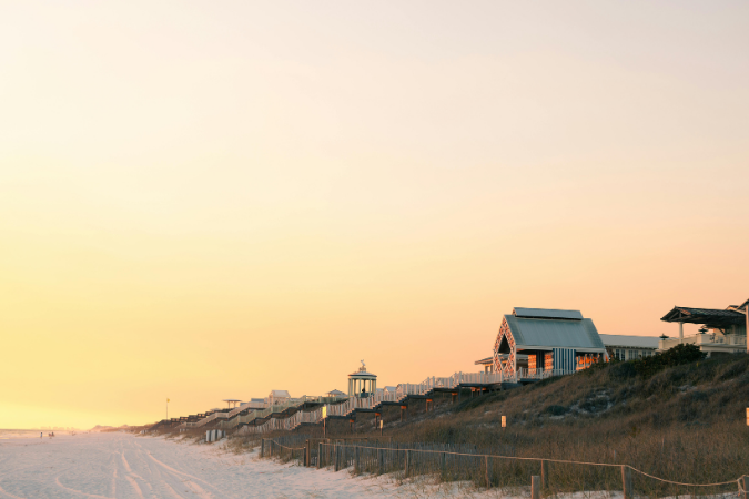 A beach in Destin, FL at sunset.