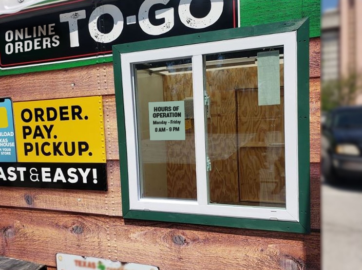 An curbside of an outdoor curbside pickup window