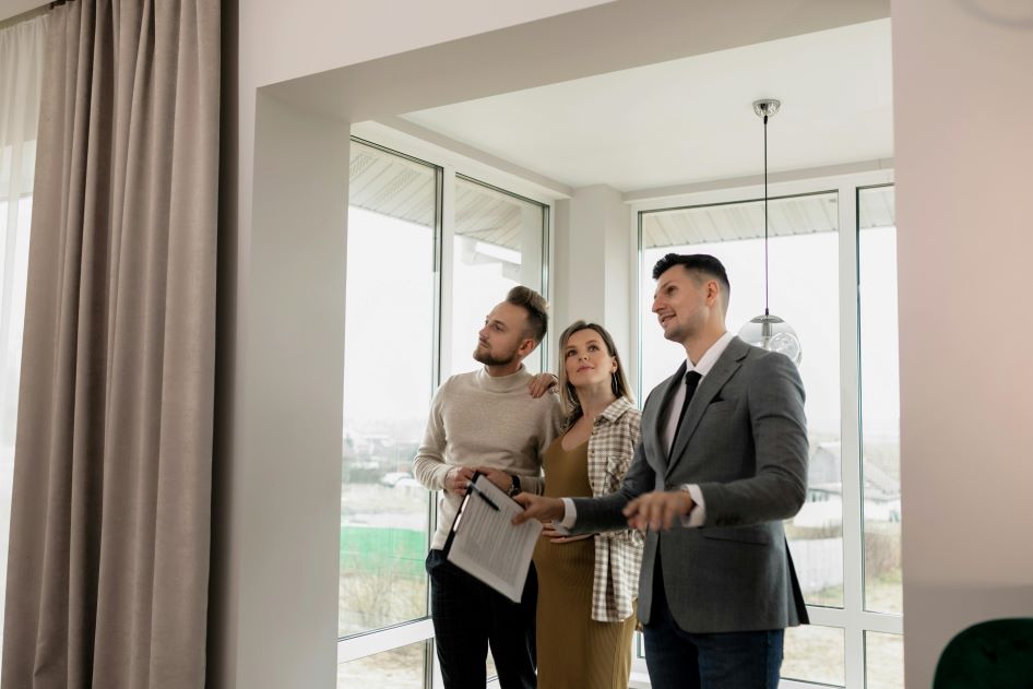 A young couple tours a home with their Orlando realtor, who shares his best secrets for buying a home.