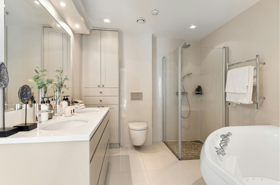 An all-white recently remodeled bathroom.