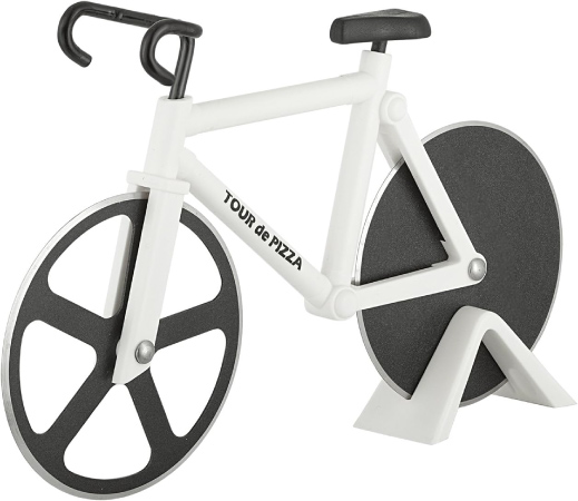 A white and black pizza cutter shaped like a mini-bicycle, with two wheels made out of blades to roll over the pie and slice it.