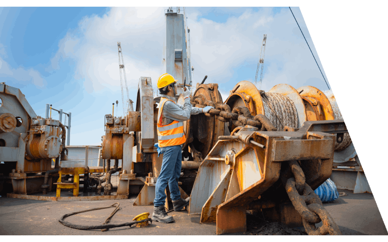 technician operating a winch