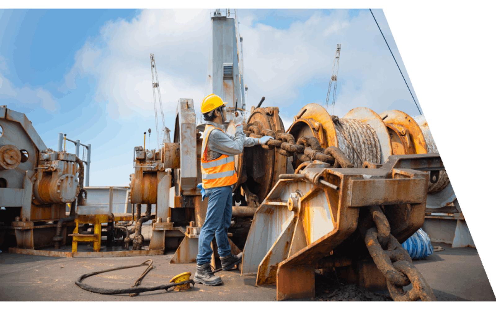 technician operating a winch