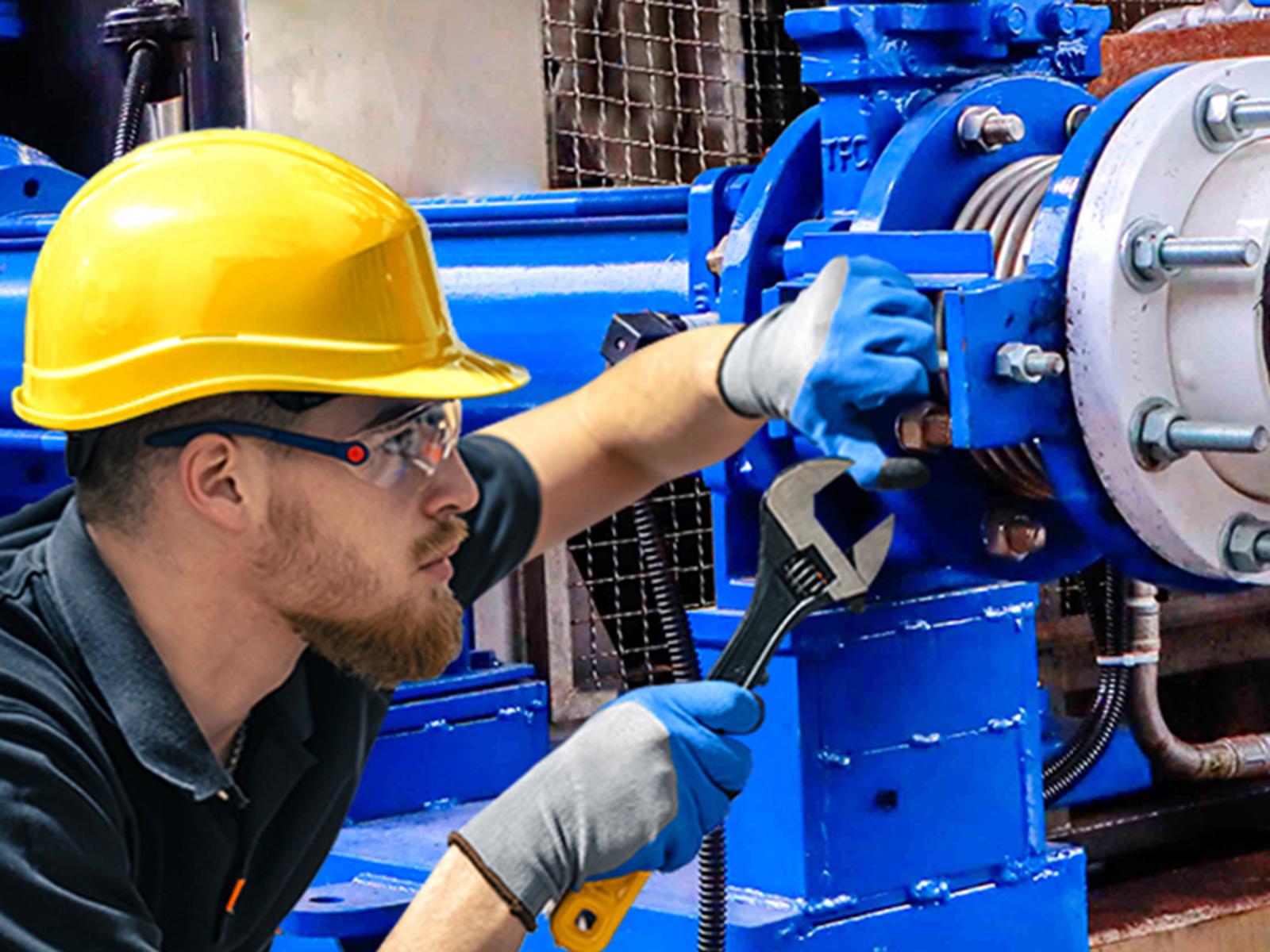 a white man repairing a pump