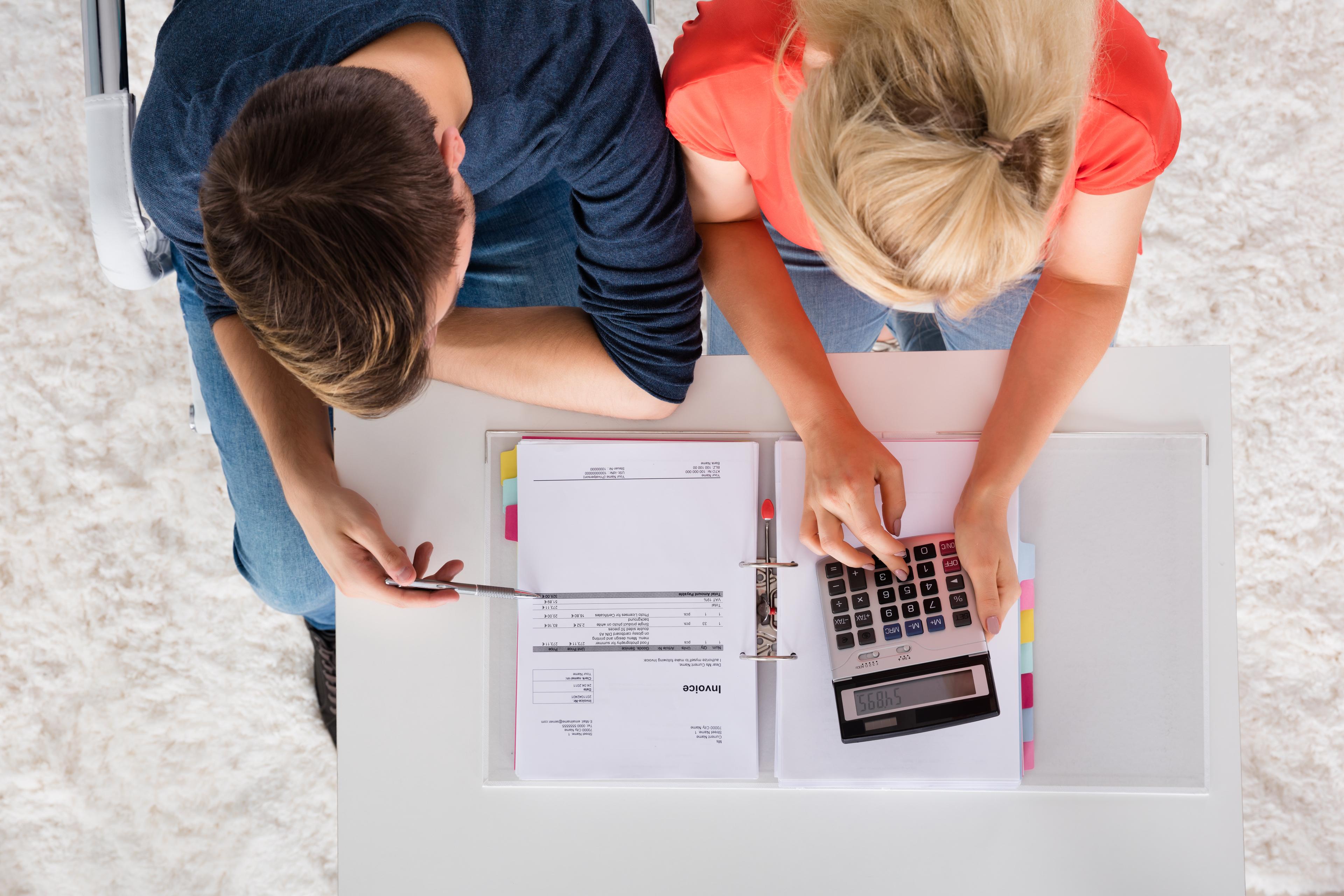 HRLIB-Couple working on budget_shutter_555948472_HR.jpg