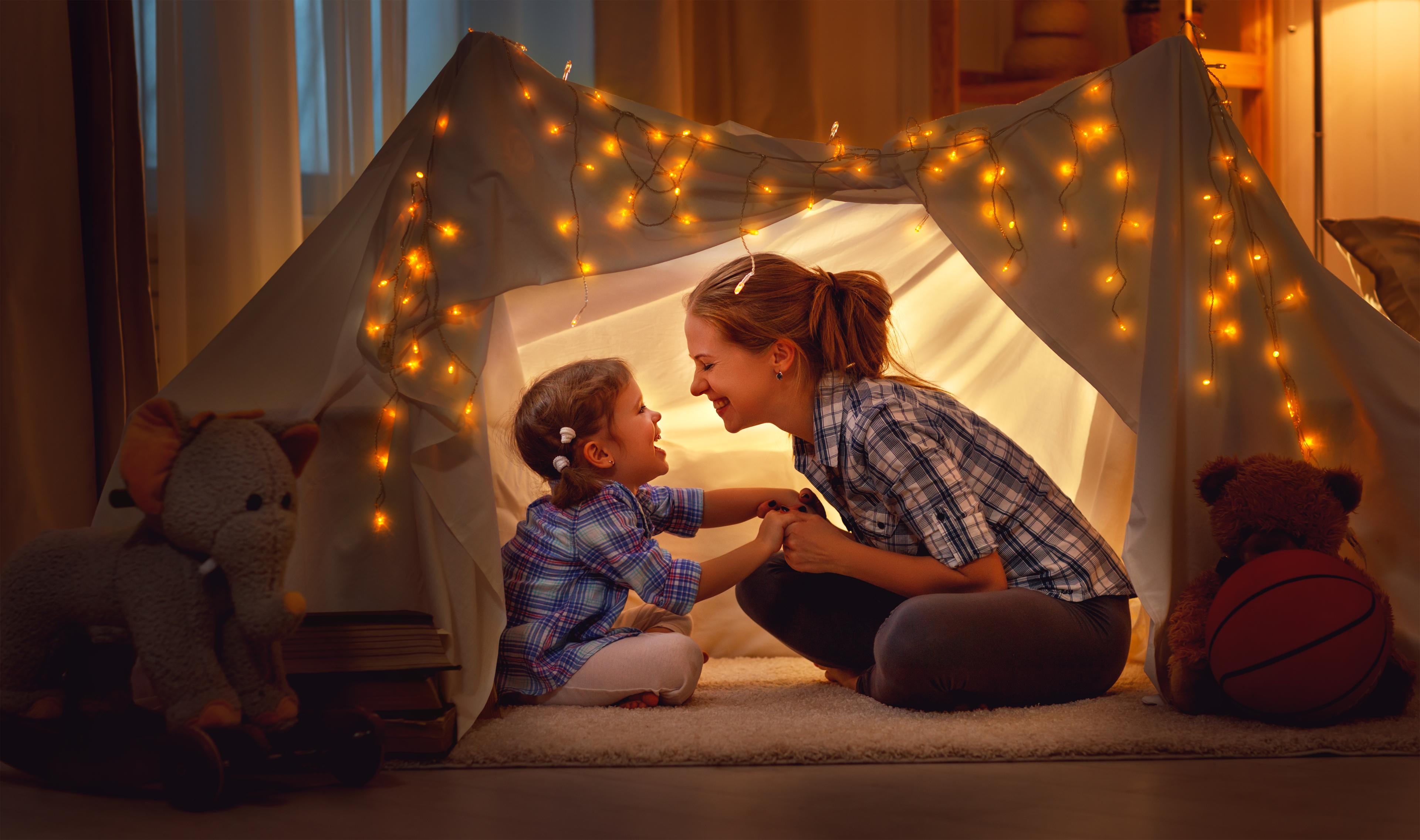 HRLIB-Mother and child in indoor tent-shutter_562342009_HR.jpg