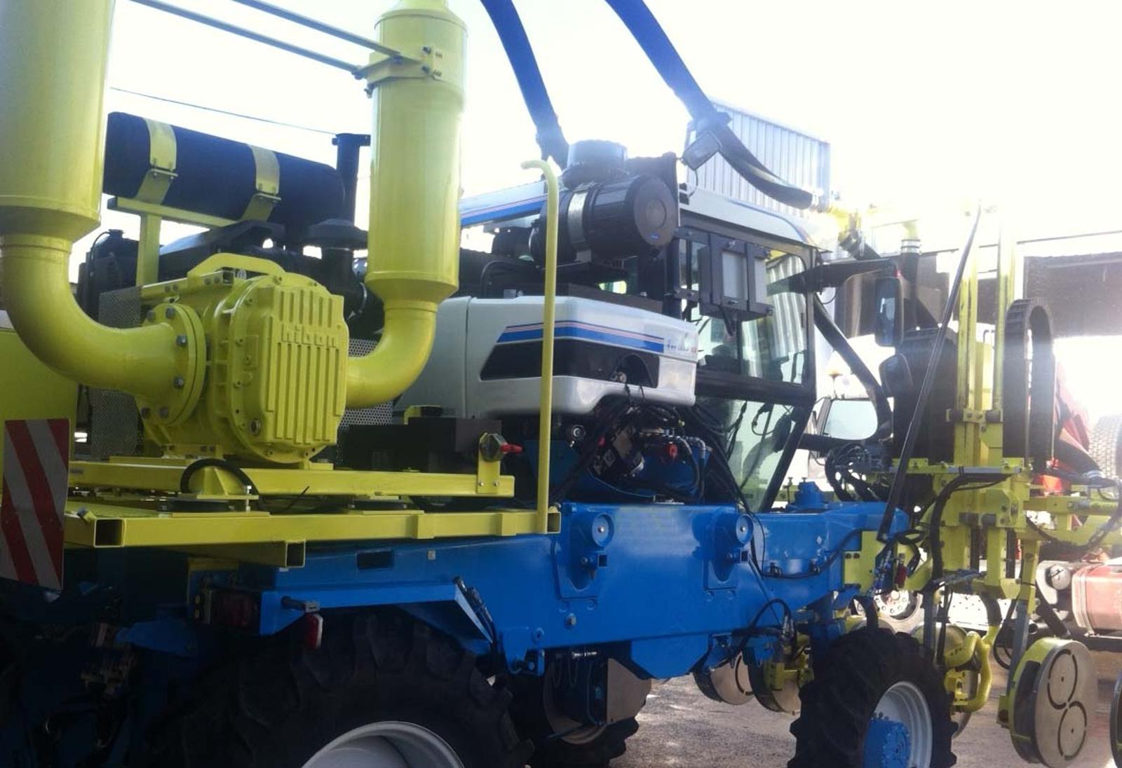 Leaf remover for vineyards with air pressure blowers