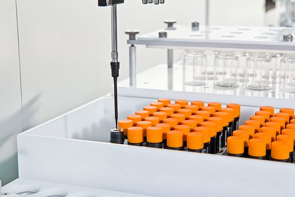 dispensing into orange lidded vial