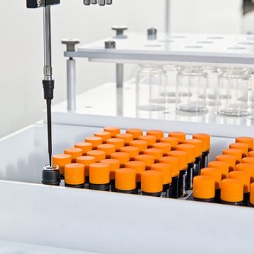 sq-01_dispensing_into_orange_lidded_vial_1.jpg