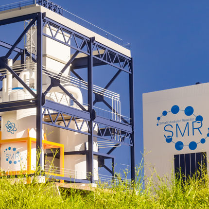 smr-small-modular-nuclear-reactor-power-plant-on-a-sunny-day-smr-is-a-future-energy.png