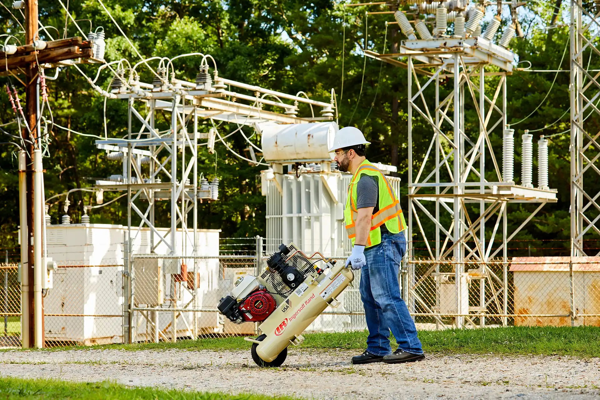 Ingersoll Rand Portable Gas Driven Air Compressor being moved