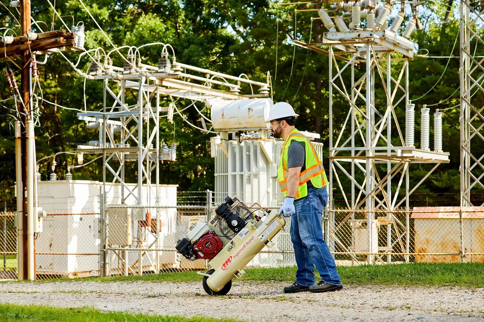 Ingersoll Rand Portable Gas Driven Air Compressor being moved